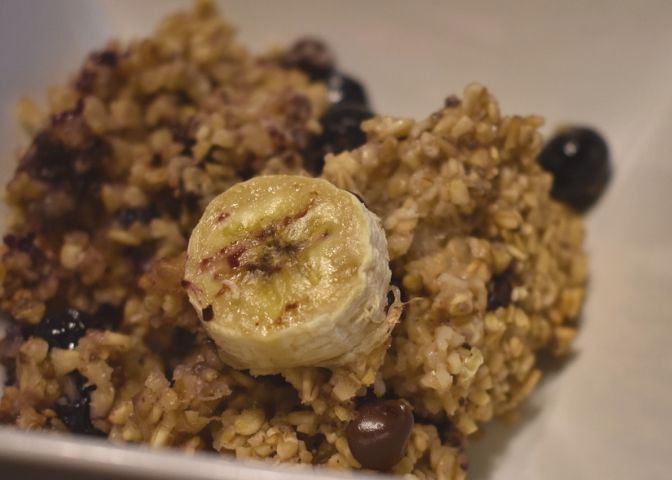 Bowl of blueberry banana chocolate chip baked oatmeal