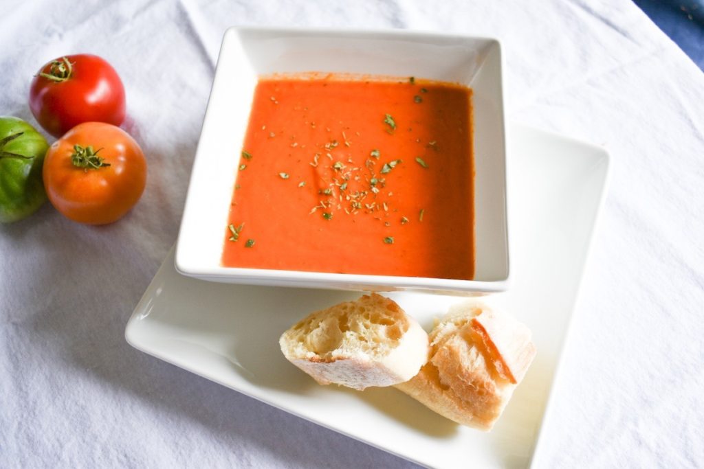 Bowl of Tomato Basil Soup with French Bread