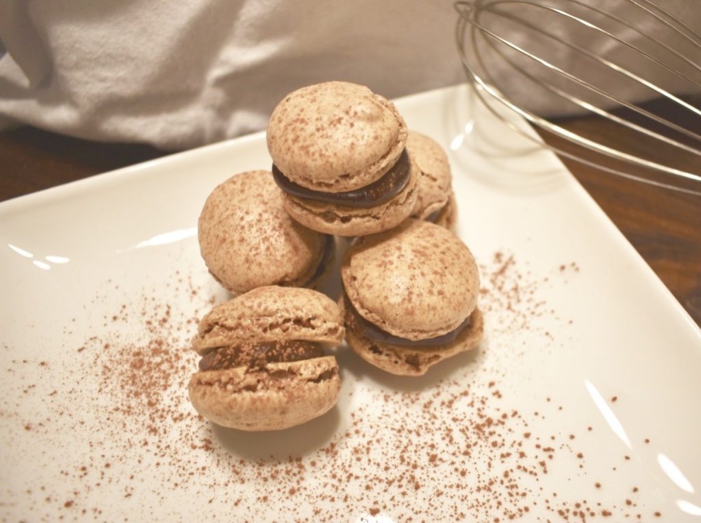 Stack of macarons with sea salt chocolate ganache