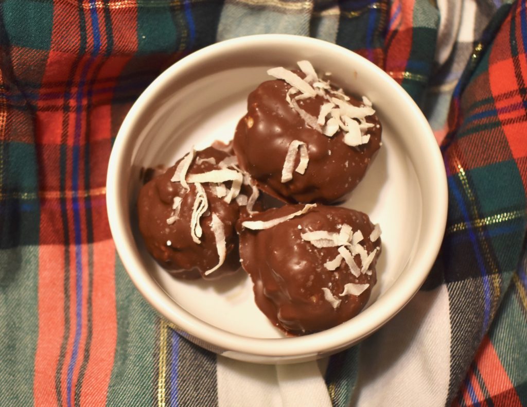Chocolate Covered Peanut Butter Bombs with Shredded Coconut