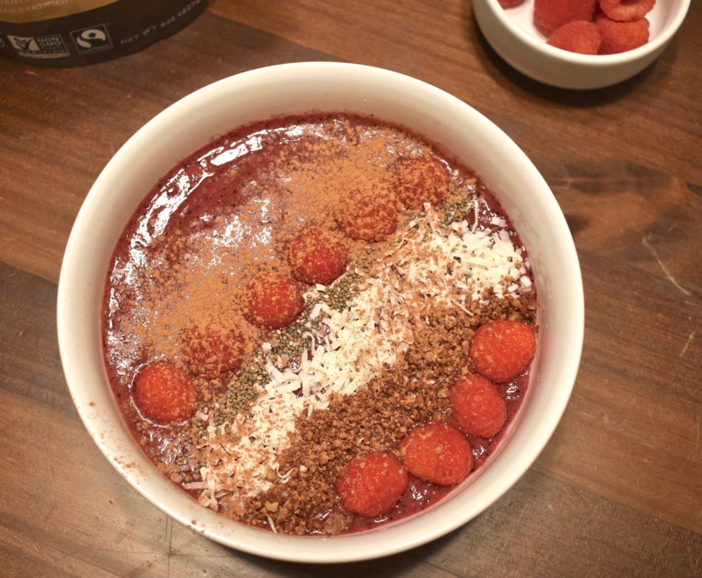 Smoothie Bowl with Assorted Toppings and Cacao Powder