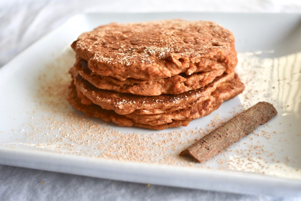 Stack of vegan cinnamon sweet potato pancakes